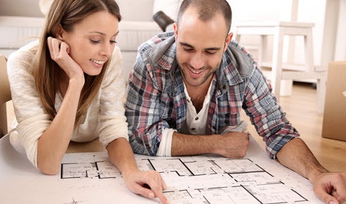 Couple reviewing home plans