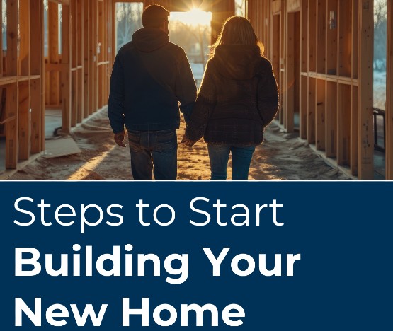 A couple walks through the building of their new home