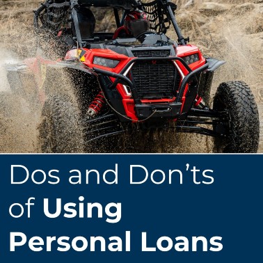 people driving a side-by-side through the mud