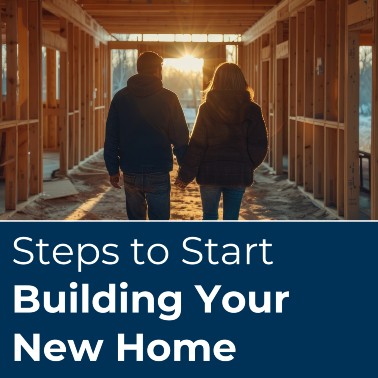 A couple walks through the building of their new home