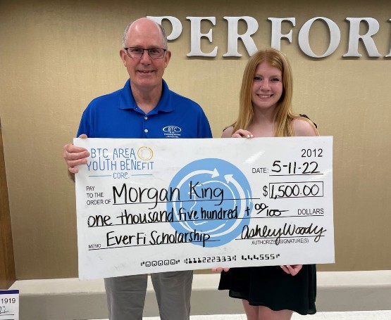 BTC Area Youth Benefit Corp. presents Morgan King with a scholarship check