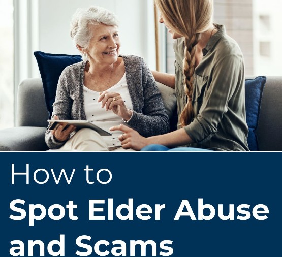 an elderly woman being assited by a younger woman while working on a tablet