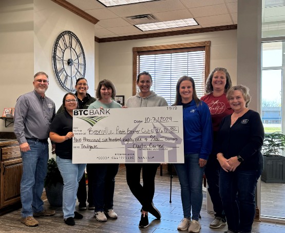 BTC presents a check for the Boonville Tailgate Donation