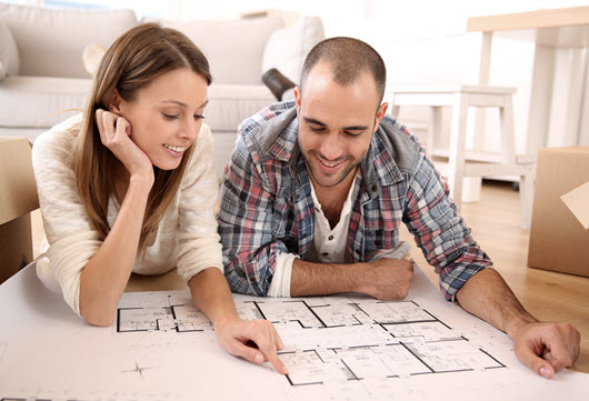 Couple reviewing home plans